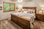 Main level bedroom with King bed and luxury linens